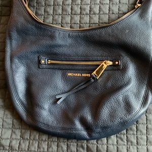 Hobo Micheal Kors  purse. Navy blue. Like new. Inside a little used looking.